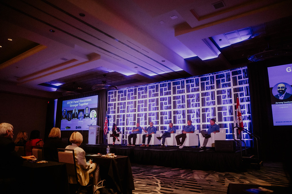 Woman on Connect stage giving presentation