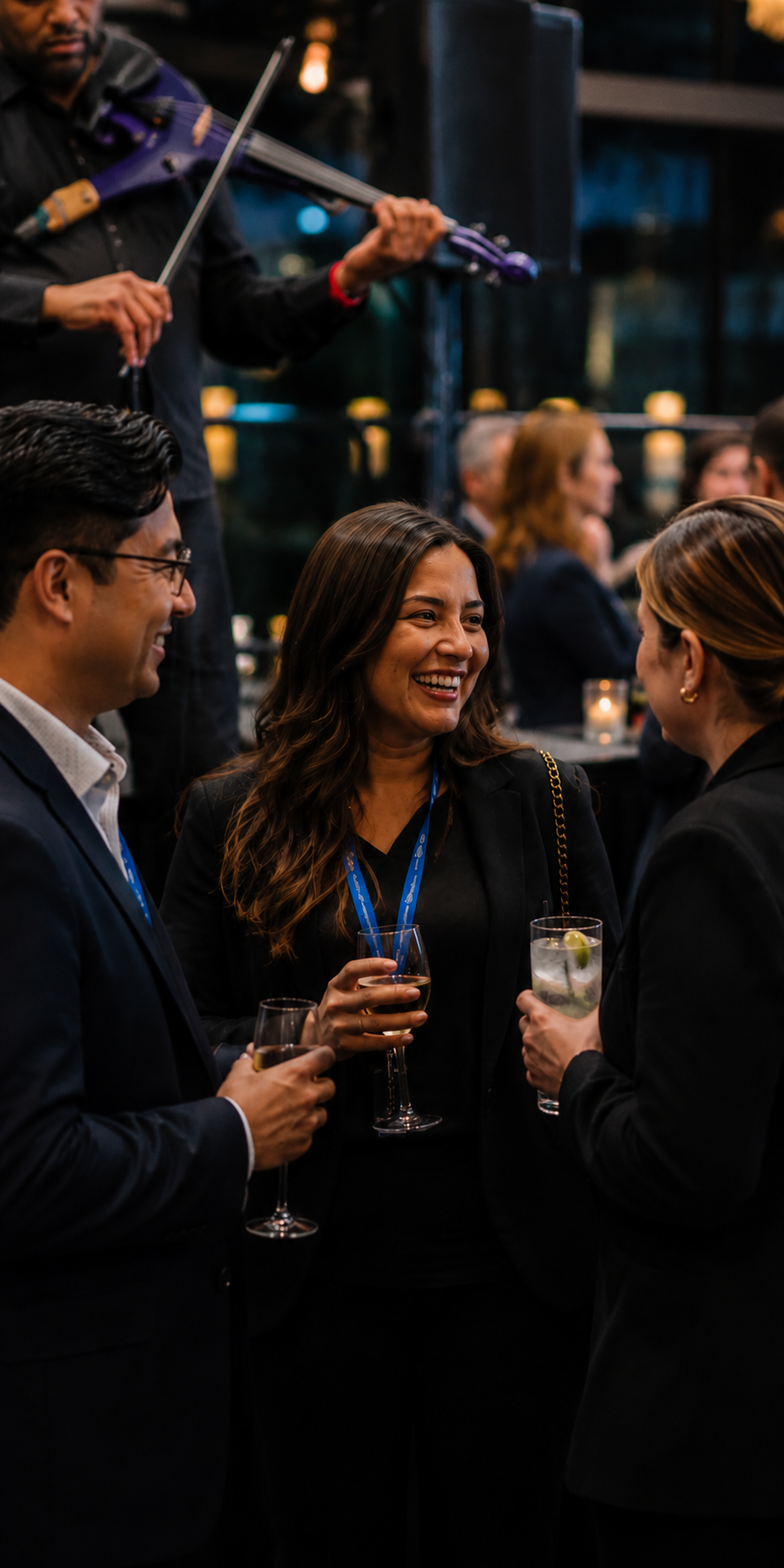 Day with DISA attendees connecting during an evening networking event