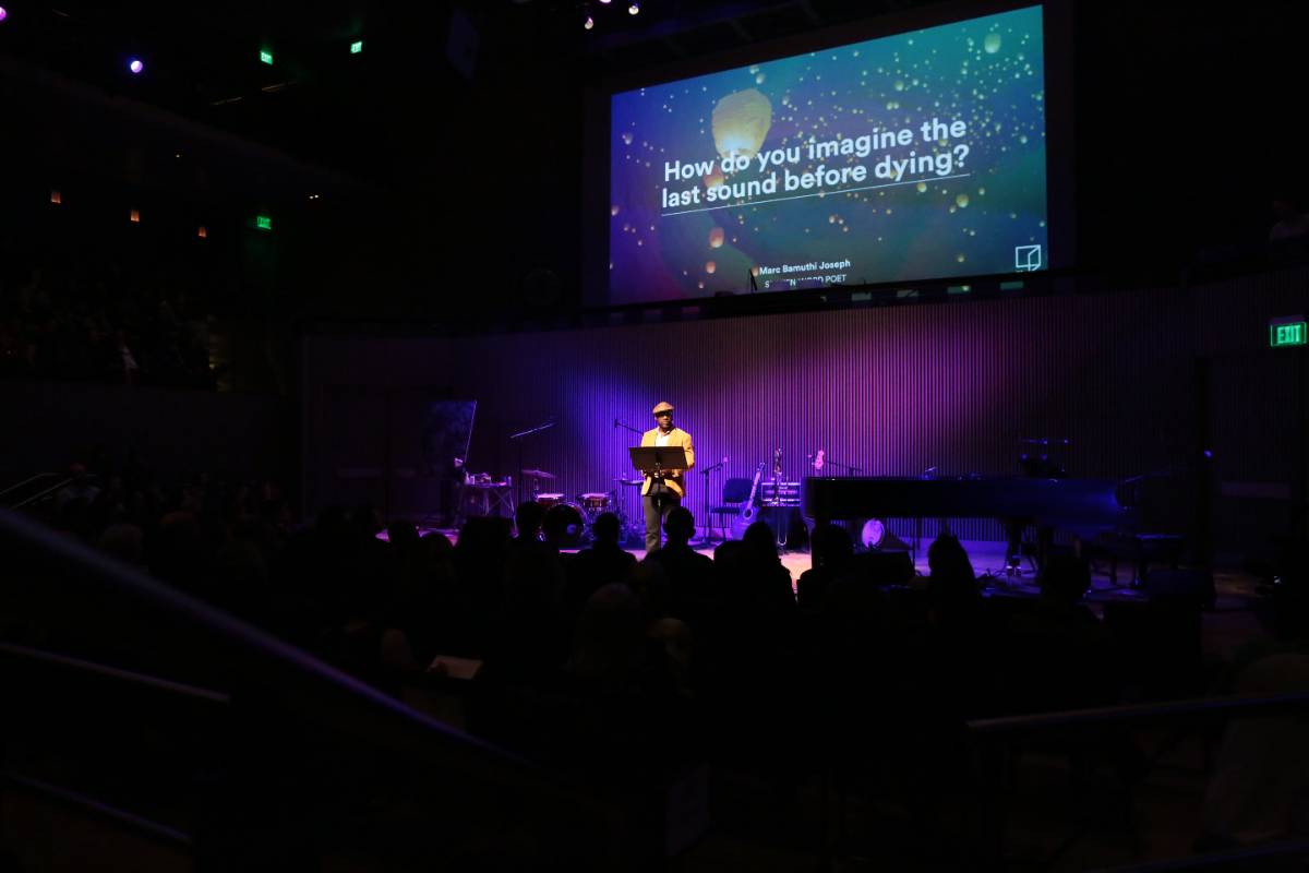 A choir performing at a Reimagine event